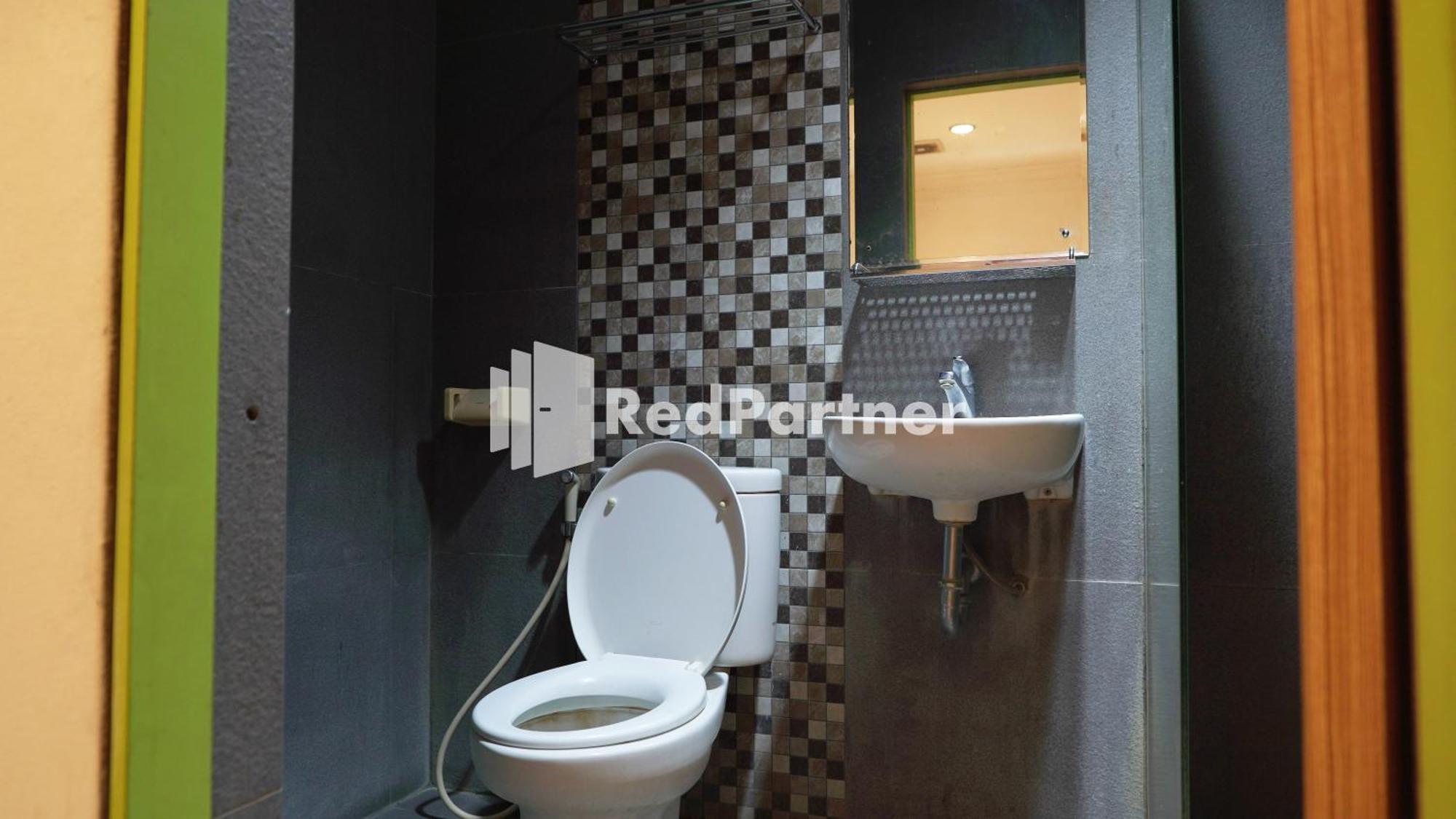 Wisma Sederhana Mitra Reddoorz Μεντάν Δωμάτιο φωτογραφία